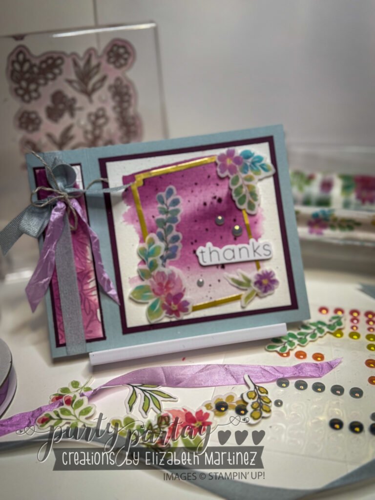 Elegant handmade card with washi tape applied over vellum, creating a soft, translucent effect and delicate layering with floral elements.